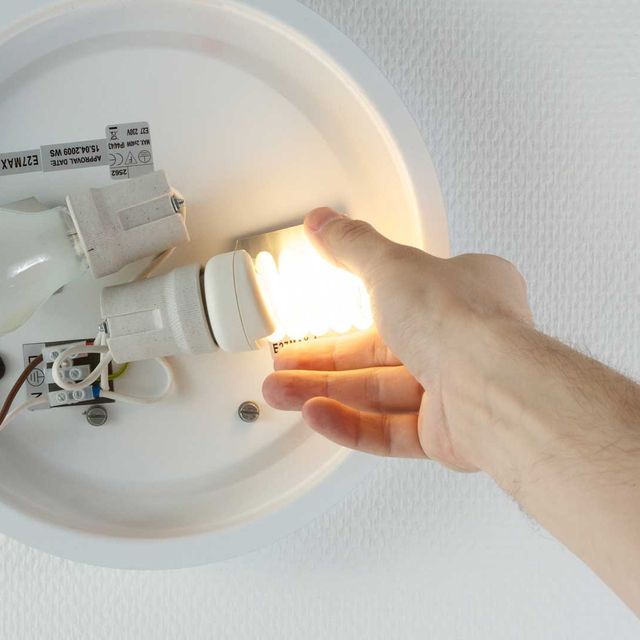 screwing-in-light-bulb