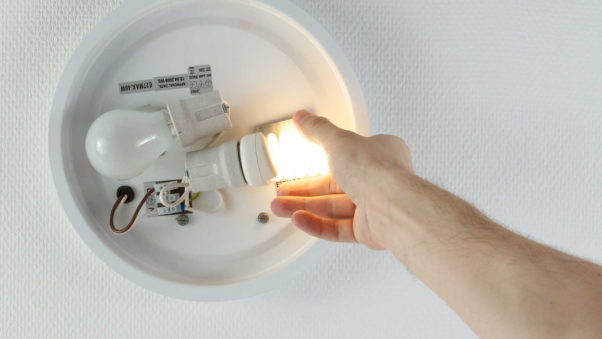 screwing-in-light-bulb